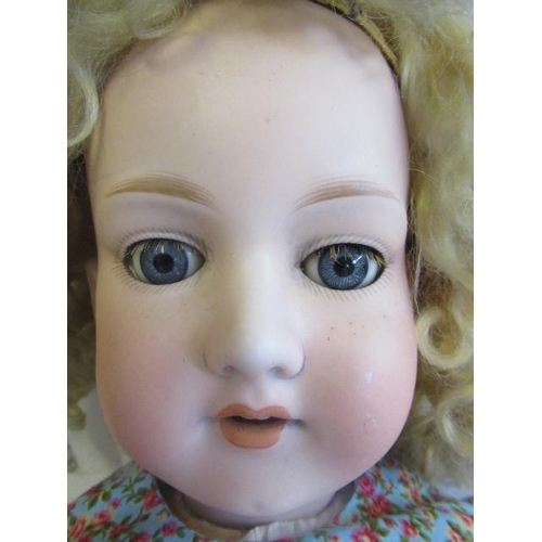 13 - An Armand Marseille bisque socket head doll, with blue glass sleeping eyes, open mouth, top teeth, b... 