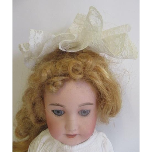 26 - An A Lanternier & Cie bisque socket head Cherie doll, with blue glass sleeping eyes, open mouth, mou... 