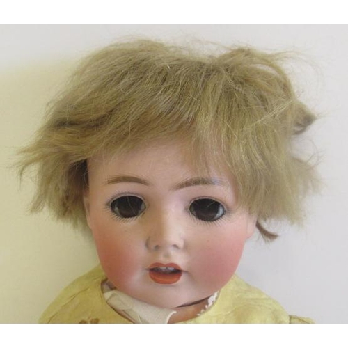 78 - A J D Kestner bisque socket head character doll, with brown glass flirty eyes, sleeping eyelids, ope... 