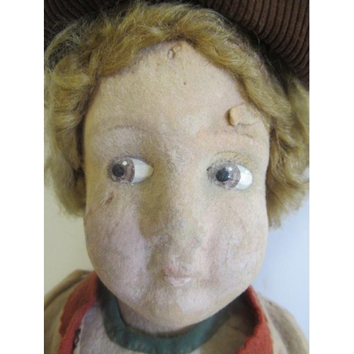 87 - A Lenci (?) boy doll, with felt face and body, painted eyes, straight legs, original felt clothing a... 