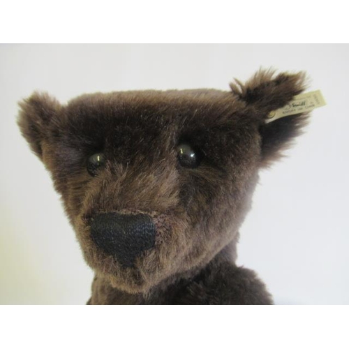 131 - A boxed Steiff British Collector's 1907 replica teddy bear, No.01236, with brown plush, growl, ear b... 