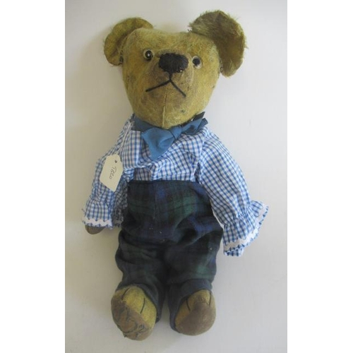 140 - A pre-war teddy, with clear glass eyes, sewn nose, straw filled jointed body, fabric pads, initials ... 