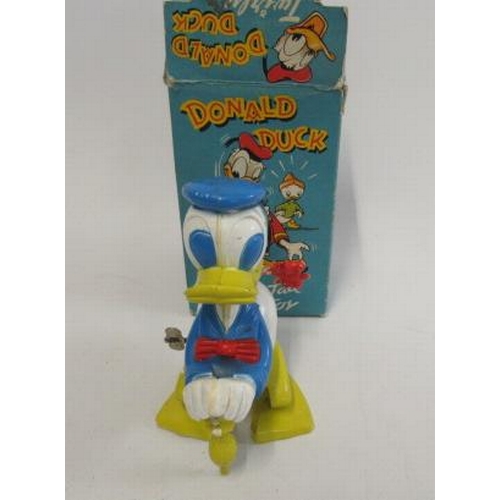 203 - A Walt Disney Productions clockwork toy of Donald Duck, box AF, in working order, F