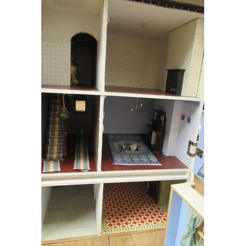 111 - A large Georgian style doll's house, comprising 11 internal spaces across four floors including the ... 