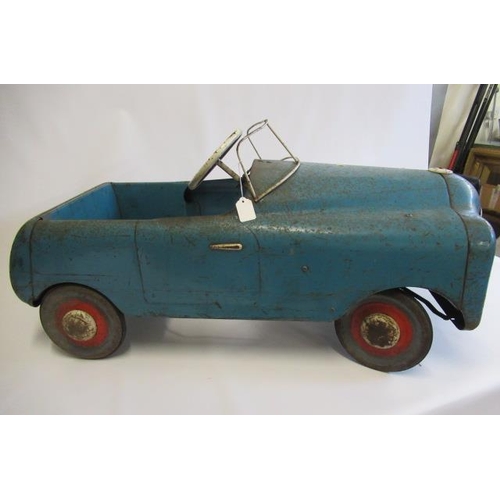 287 - A vintage pedal car, possibly Triang, of metal construction, painted in blue and white, with two ton... 