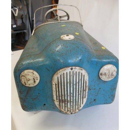 287 - A vintage pedal car, possibly Triang, of metal construction, painted in blue and white, with two ton... 