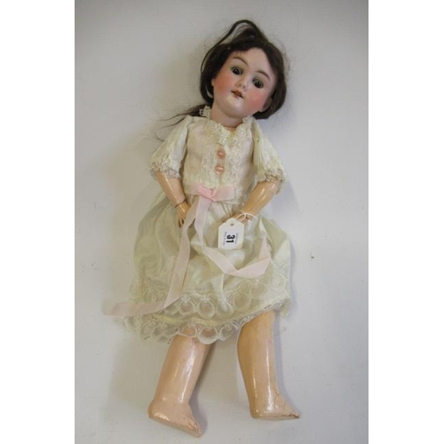 31 - A Max Handwerck bisque socket head doll, with brown glass sleeping eyes, open mouth, upper teeth, br... 