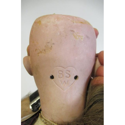 41 - A Bruno Schmidt bisque socket head doll, with brown glass sleeping eyes, open mouth, applied teeth, ... 