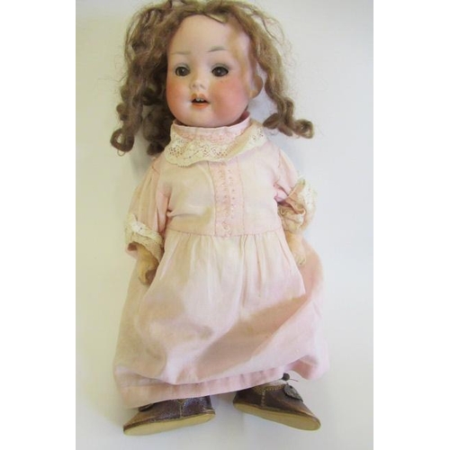 55 - A Porzellamfabrik Mengersgereuth bisque socket head doll, with brown glass sleeping eyes, open mouth... 