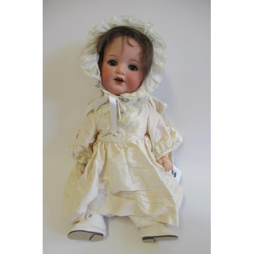 59 - An Armand Marseille Koppelsdorf bisque socket head character doll, with brown glass sleeping eyes, o... 