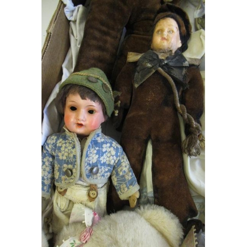 64 - A collection of dolls and soft toys, including two composition head sailor boys with musical mechani... 