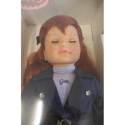 98 - A boxed Gotz Fergie doll, with blue sleeping eyes, auburn hair and engagement suit, box 23 1/4