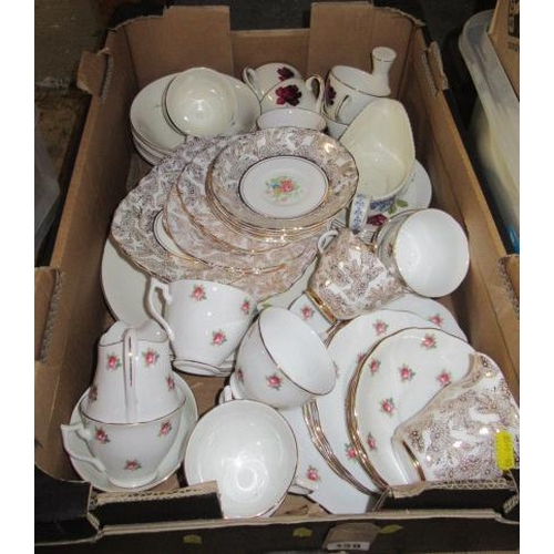 130 - BOX WITH THREE TEA SETS