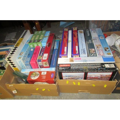 133 - TWO BOXES OF JIGSAWS