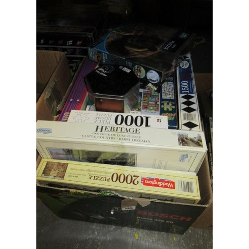 135 - BOX OF JIGSAWS AND A RAILWAY SET