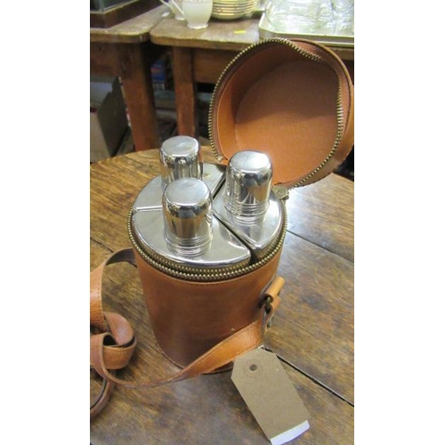 19 - LEATHER CASED HIP FLASK