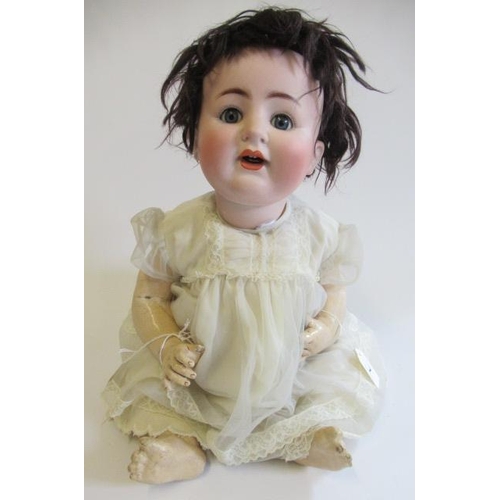 7 - An Alt, Beck & Gottschalck bisque socket head doll, with blue glass sleeping eyes, open mouth, two a... 