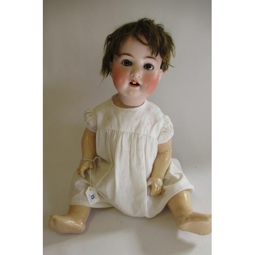 15 - A Heubach Koppelsdorf bisque socket head doll, with brown glass sleeping eyes, open mouth, short bro... 