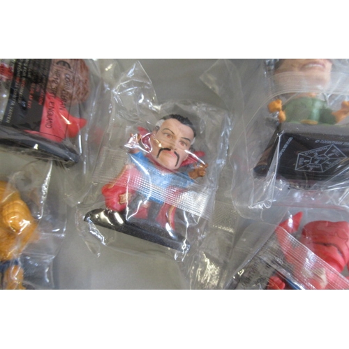 375 - Thirty three Corinthian Marvel Super Hero figures, 50mm high with big heads