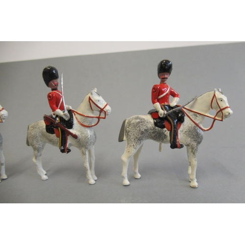 374 - Hocker mounted Royal Horse Guards, solid cast hand painted with moving arms, boxed E