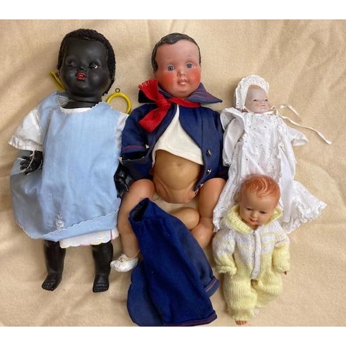 97 - Four vintage dolls, comprising a 10 1/2