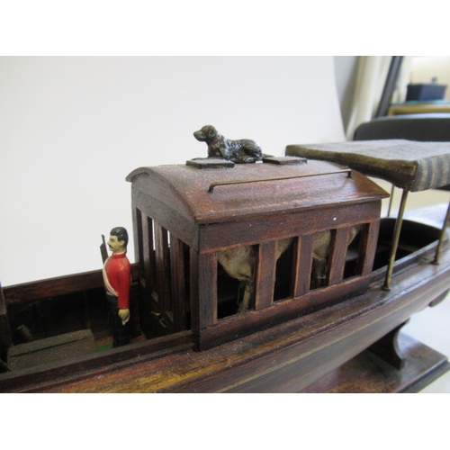 198 - A modern wooden model of a steam launch and four lead figures with flag, F