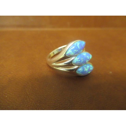 172 - SILVER AND THREE STONE OPAL RING