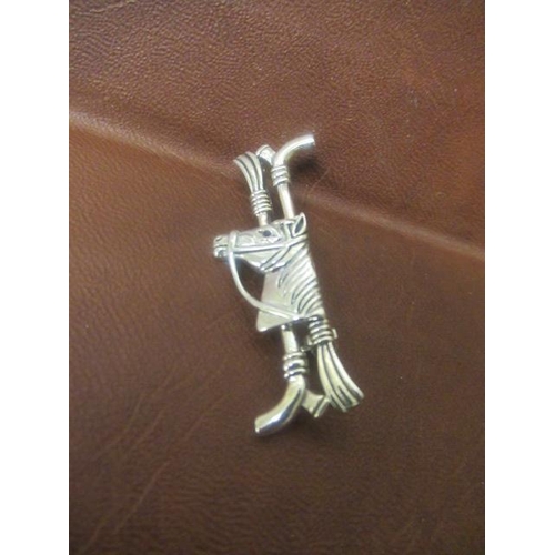 199 - SILVER HORSE AND CROP BROOCH