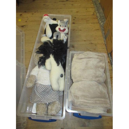 576 - THREE PLASTIC CRATES  THROW AND SOFT TOYS