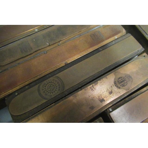 100 - Approximately 40 Copper cigar printing blocks, mounted on hardwood