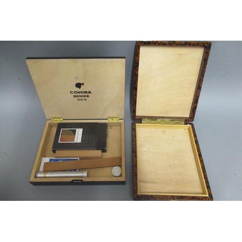 118 - Two cigar boxes, comprising 1 Cohiba Behike humidor and 1 tortoise effect presentation box to fit 12... 