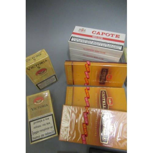 127 - An assortment of cigars comprising 1 box of 25 Ritmeester half corona, 5 packs of 10 Capote mini-clu... 