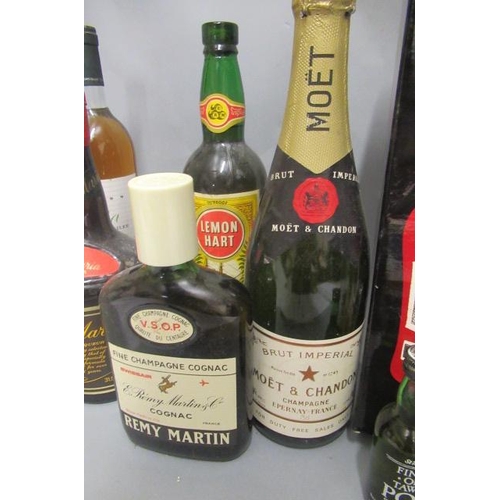 13 - An assortment of wine & liqueur, including 1 boxed Cherry Marnier, 1 Remy Martin fine champagne cogn... 