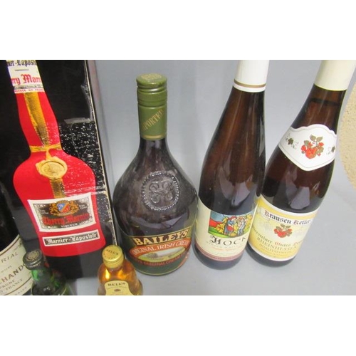 13 - An assortment of wine & liqueur, including 1 boxed Cherry Marnier, 1 Remy Martin fine champagne cogn... 