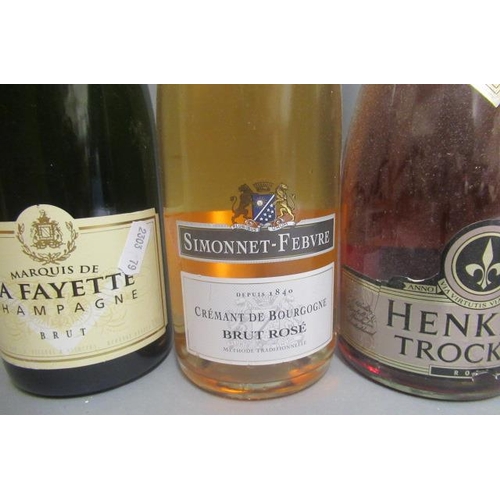 134 - Six bottles of sparkling wine, comprising 2 bottles La Fayette champagne, 1 bottle Lanson, 1 bottle ... 