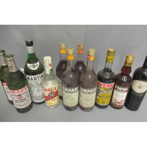 15 - A large assortment of spirits and liqueur, including 4 Campari, 2 Pernod Fils, 1 Bristol Cream, 1 Ir... 