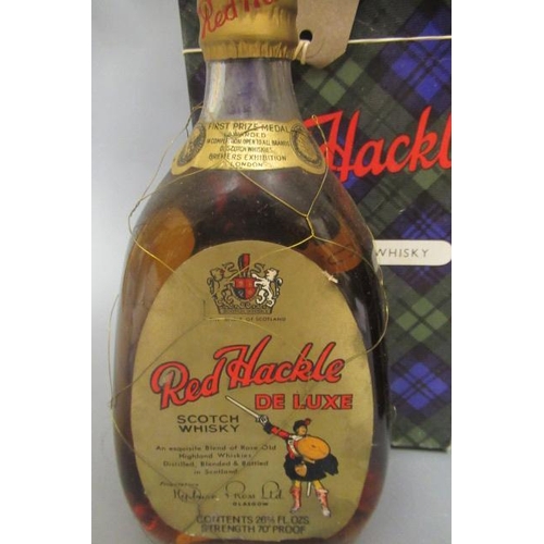 203 - Two boxed bottles of whisky, comprising Red Hackle De Luxe and Bells 12yr old De Luxe