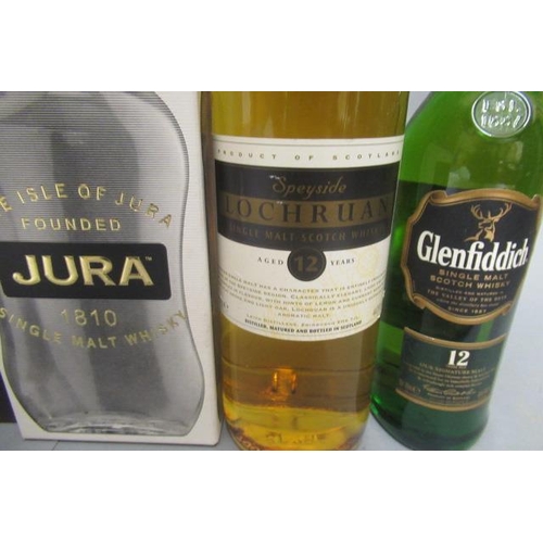 232 - Five bottles and one half bottle scotch whisky, comprising 1 boxed Jura 10yr old, 1 boxed The Peat M... 