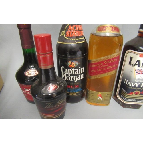 32 - 8 mixed bottles, including Johnnie Walker Red Label whisky, Captain Morgan rum, Lamb's Rum, Smirnoff... 