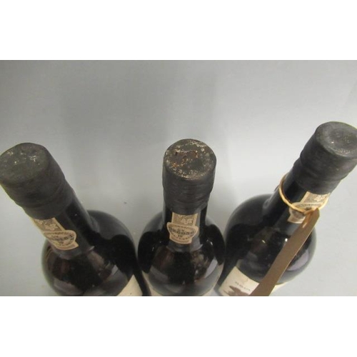 326 - Three bottles 1977 Gould & Campbell vintage port