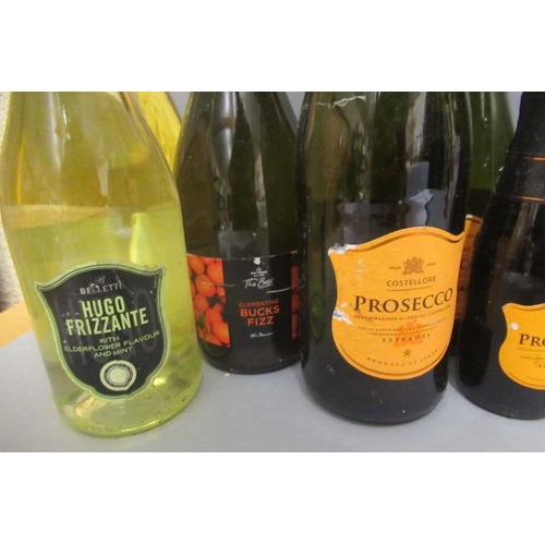 47 - 12 bottles comprising, 2 and 1 1/2 bottles Prosecco, 1 bottle Nicholas de Montbart champagne, 1 bott... 