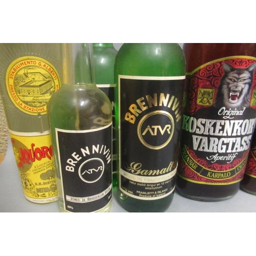 56 - 12 bottles of mixed spirits & liqueurs, comprising 2 1litre Koskenkorva Vargtass original, 1 and 1/2... 