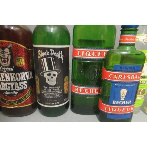 56 - 12 bottles of mixed spirits & liqueurs, comprising 2 1litre Koskenkorva Vargtass original, 1 and 1/2... 