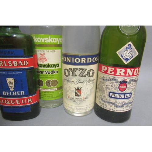 56 - 12 bottles of mixed spirits & liqueurs, comprising 2 1litre Koskenkorva Vargtass original, 1 and 1/2... 