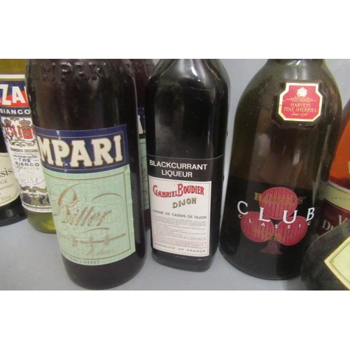 57 - 13 bottles of mixed spirits & liqueur, comprising 2 litres Campari, 1.5litre Cinzano Bianco, 1 Peter... 