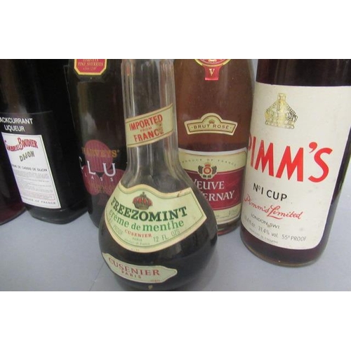 57 - 13 bottles of mixed spirits & liqueur, comprising 2 litres Campari, 1.5litre Cinzano Bianco, 1 Peter... 