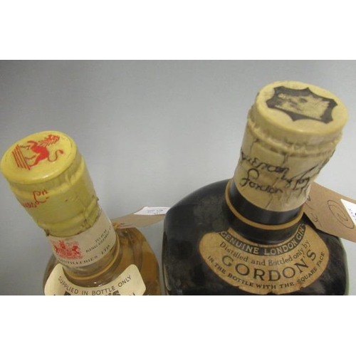 62 - 2 bottles of vintage London gin, comprising 1 Gordons Special Dry Gin with snap cap and 1 half bottl... 