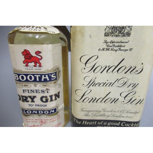 62 - 2 bottles of vintage London gin, comprising 1 Gordons Special Dry Gin with snap cap and 1 half bottl... 