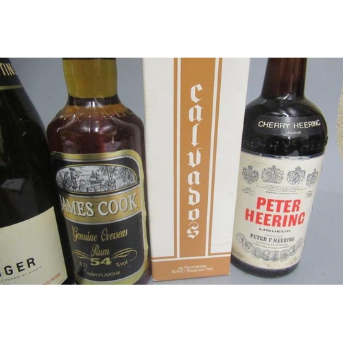 65 - 12 bottles of mixed alcohol, comprising 1 bottle Tattinger champagne, 1 Woods 100 Old Navy Rum, 1 Pe... 