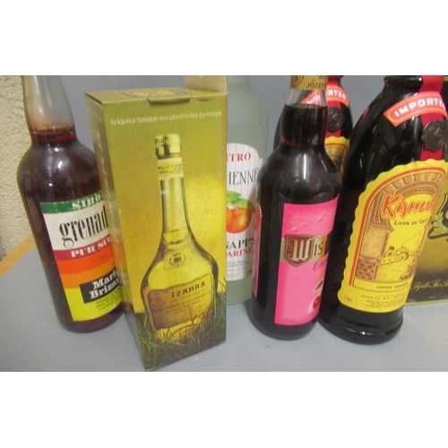 67 - 11 bottles of mixed liqueur including 1litre Metaxa, 1 Maraschino, 1 35cl boxed Izarra, 1 boxed Eoli... 